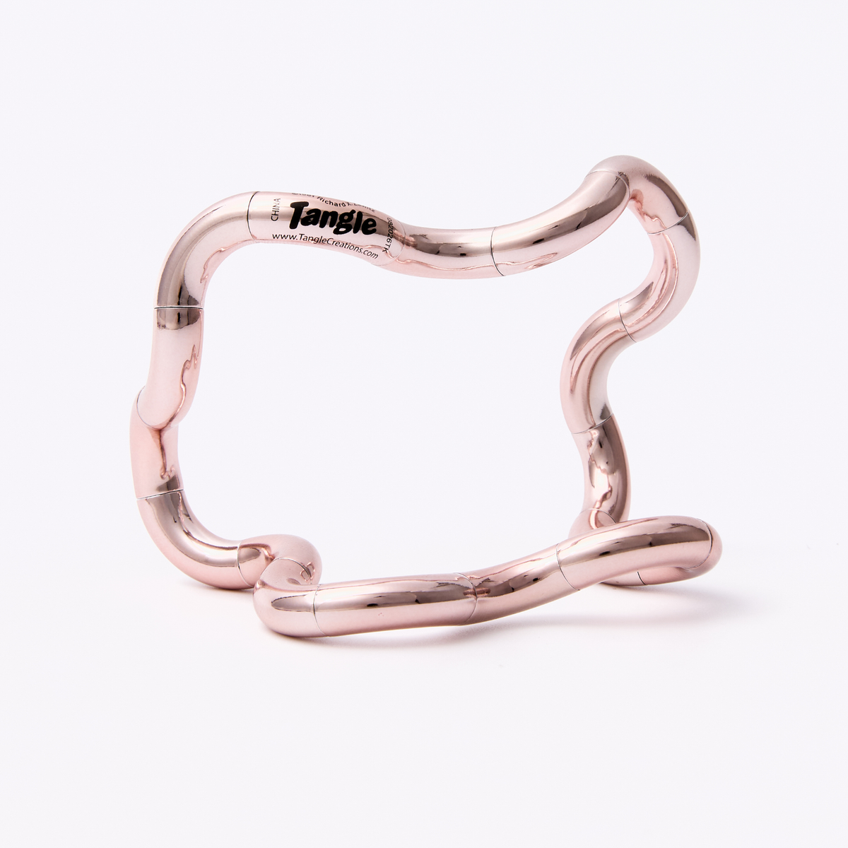 Tangle Jr. Metallic fidget toy in an open extended configuration, featuring a high-gloss metallic rose gold chrome finish on a white background